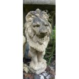 A garden stone statue of a Lion