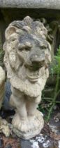 A garden stone statue of a Lion