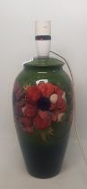 Moorcroft Anemone on green ground table lamp, 26cm to top of ceramic.