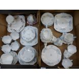 Extensive blue rock tea ware items consisting of Teapot, two cake plates, sugar bowl, 2 milk jugs,