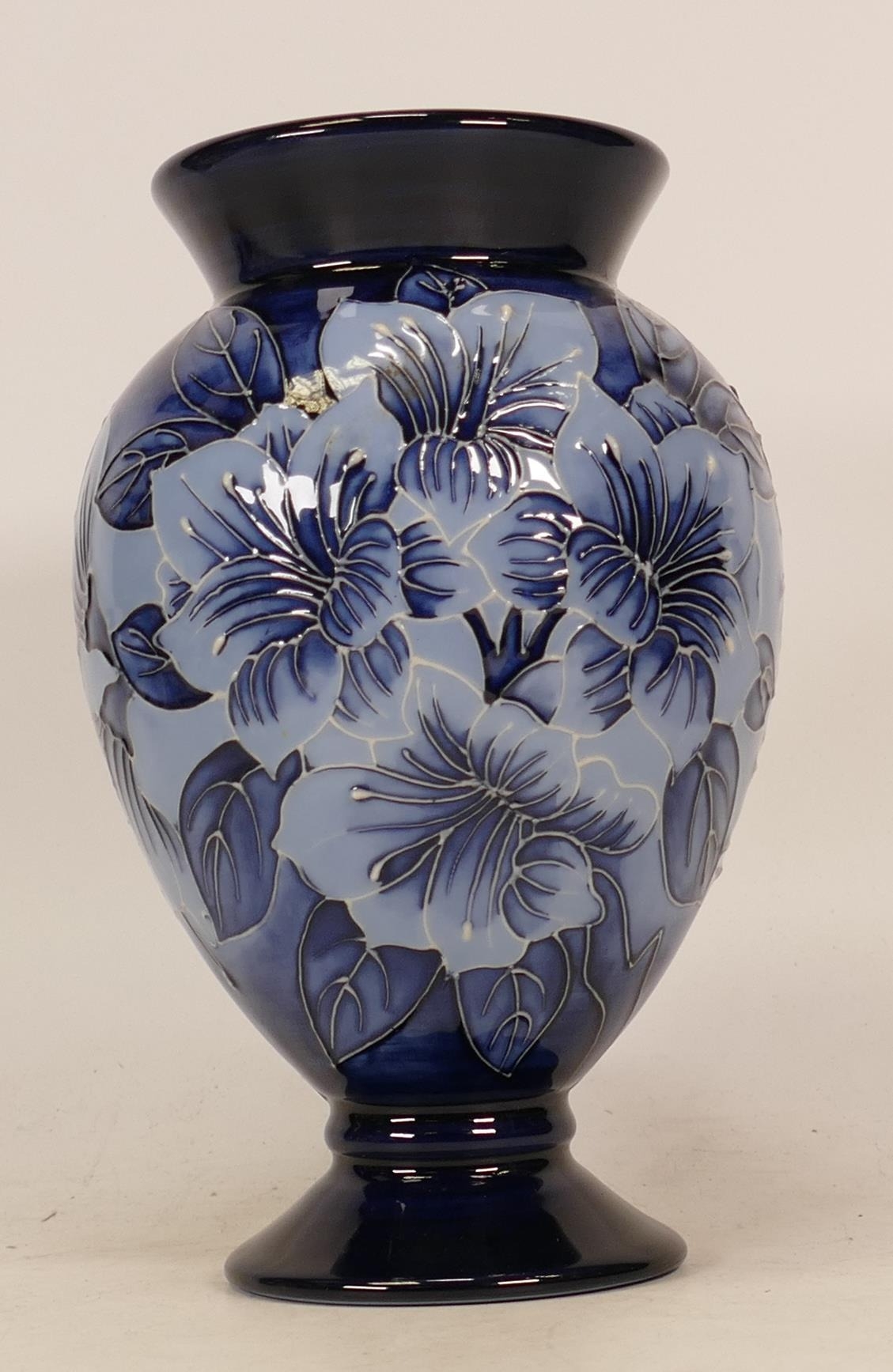 Moorcroft blue on blue floral decorated trial vase, red dot seconds, height 17.5cm