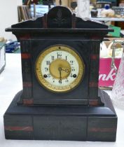 A Victorian Slate Mantle Clock with Enamel Arabic Numeral Dial. Some small nibbles and chips.