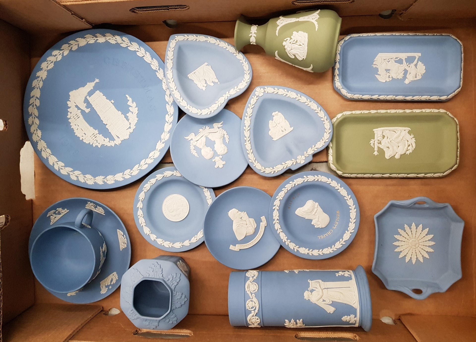 A collection of Wedgwood jasperware items to include vases, trays, cup and saucer, pin dishes etc (1