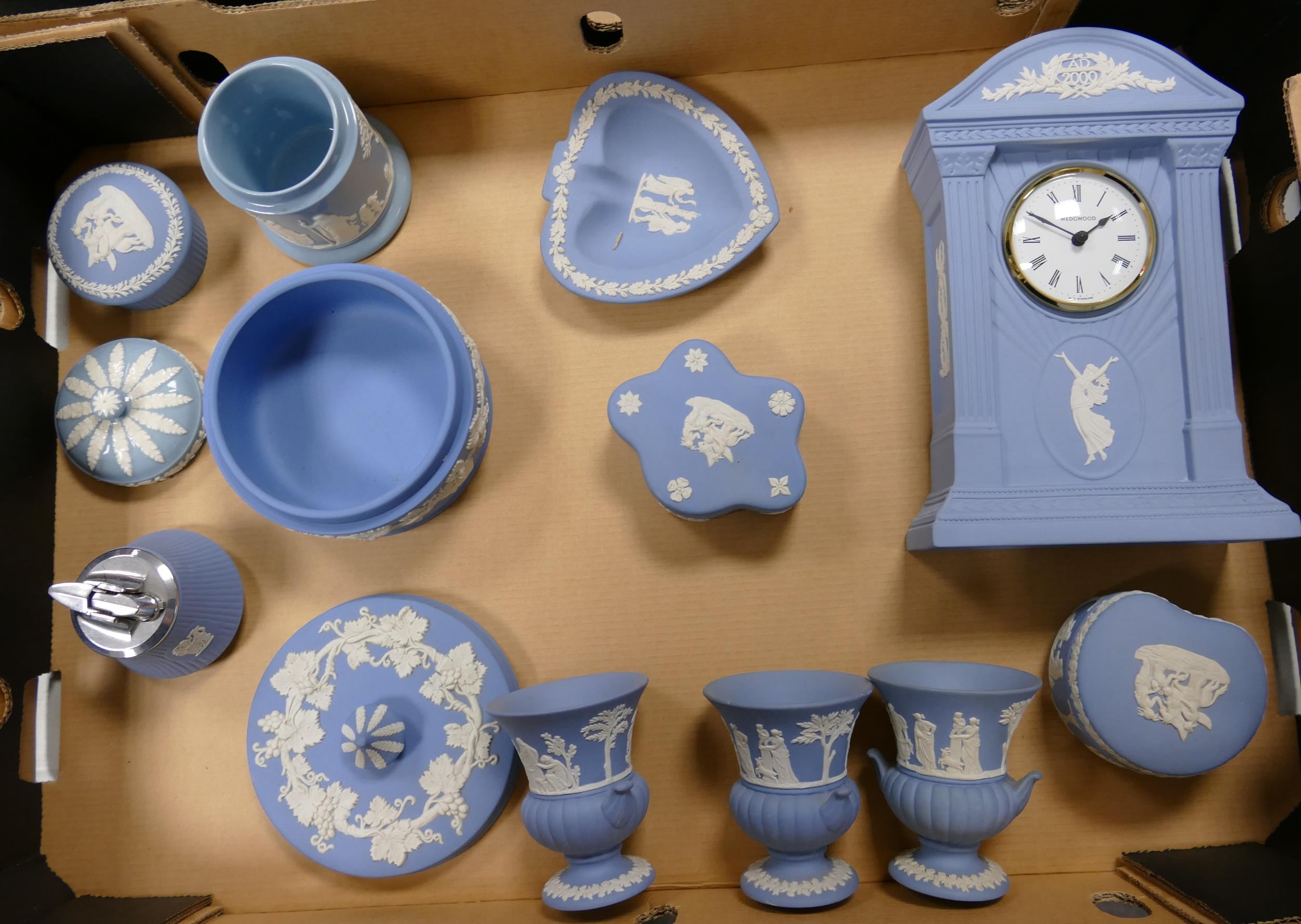 A collection of Wedgwood Jasperware to include mantle clock, vases, lidded boxes, lighter, etc (1