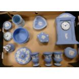 A collection of Wedgwood Jasperware to include mantle clock, vases, lidded boxes, lighter, etc (1