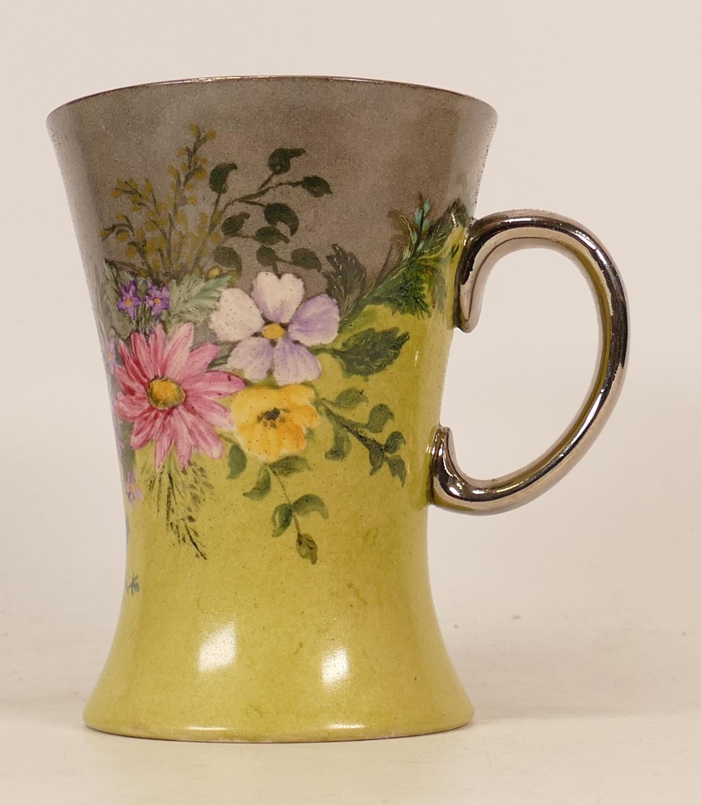 Early Moorcroft floral mug with silver gilt handle and top rim