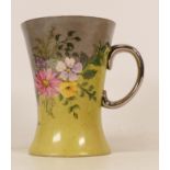 Early Moorcroft floral mug with silver gilt handle and top rim