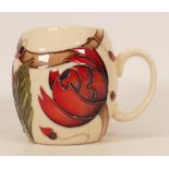 Moorcroft trial mug decorated in red flowers dated 10/12/2014