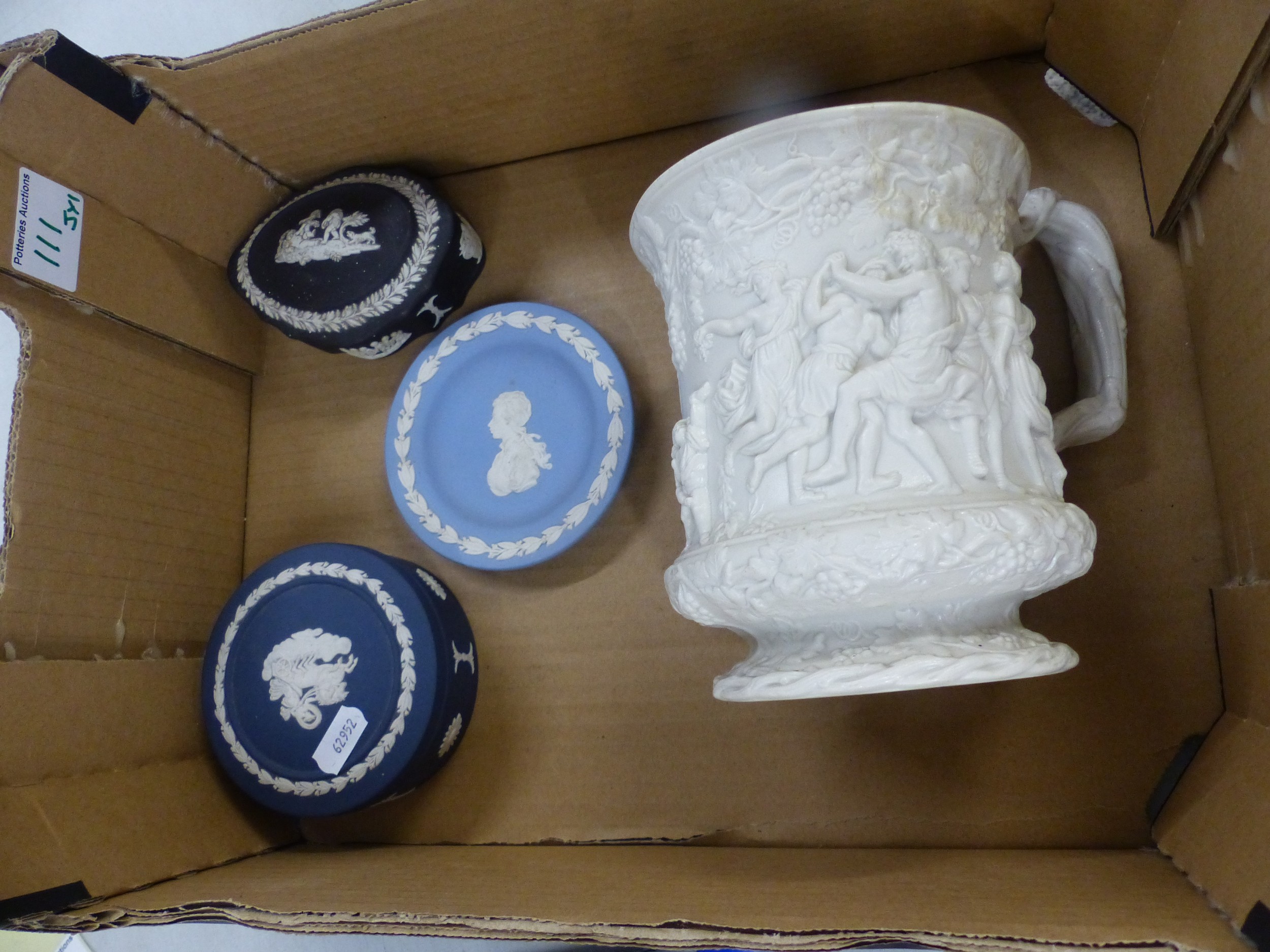 Wedgwood Jasperware items to include white on blue lidded pot, black shaped pot, blue jasperware pin