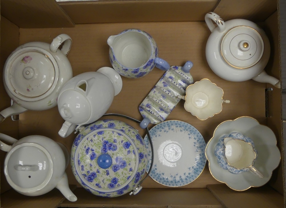 A collection of Shelley tea ware to include patterns blue floral biscuit barrel, jug and toast rack,