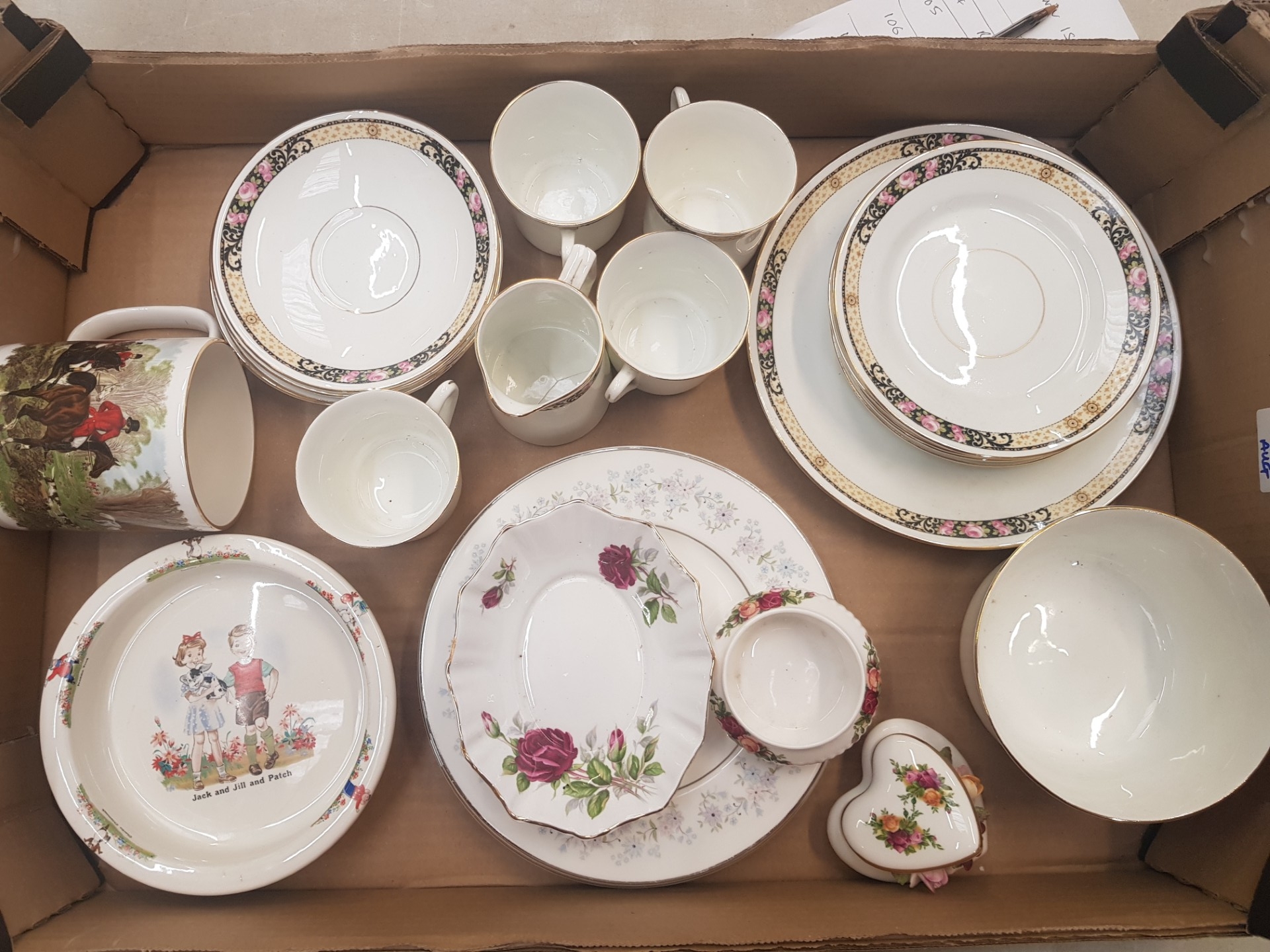 A mixed collection of ceramic items to include a floral/gilt part tea set, mid-century nursery
