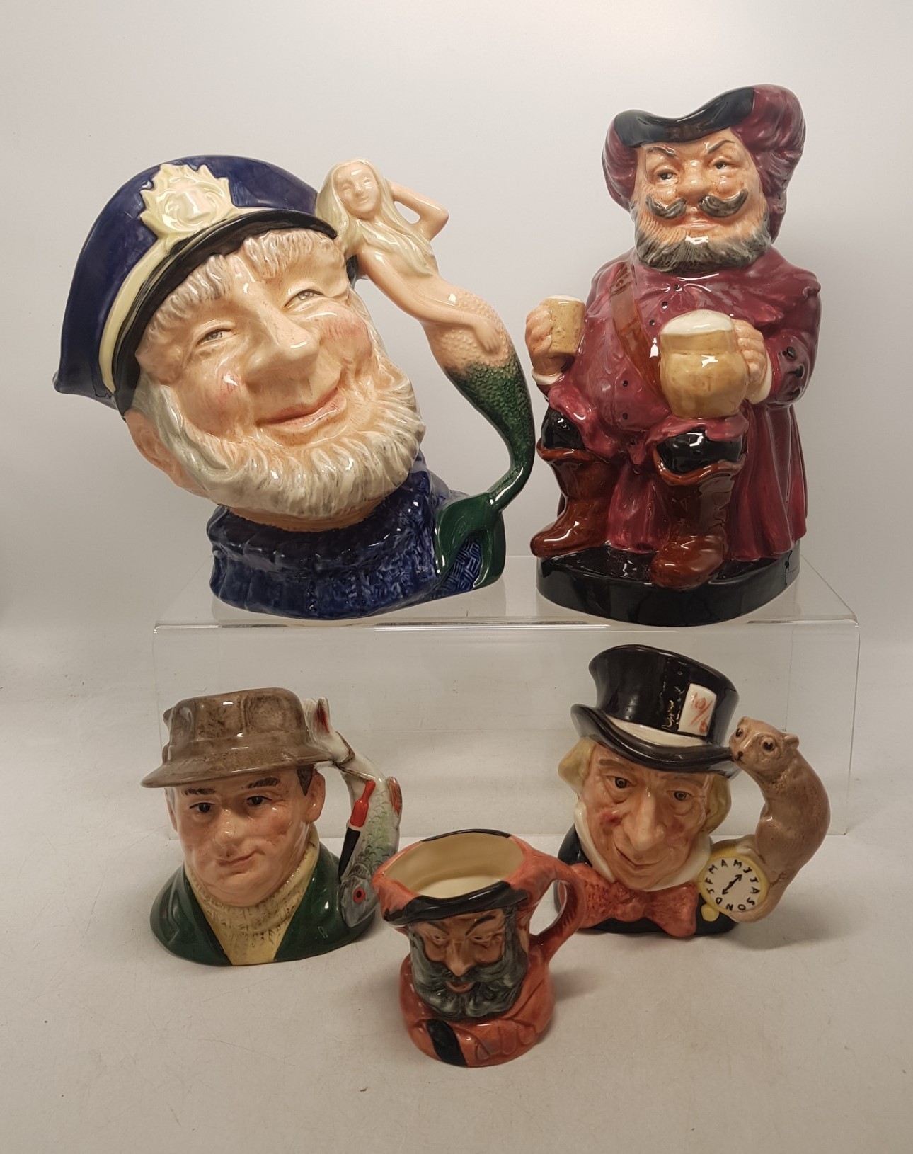 A collection of Royal Doulton character and Toby jugs to include 2nds large character jug Old Salt
