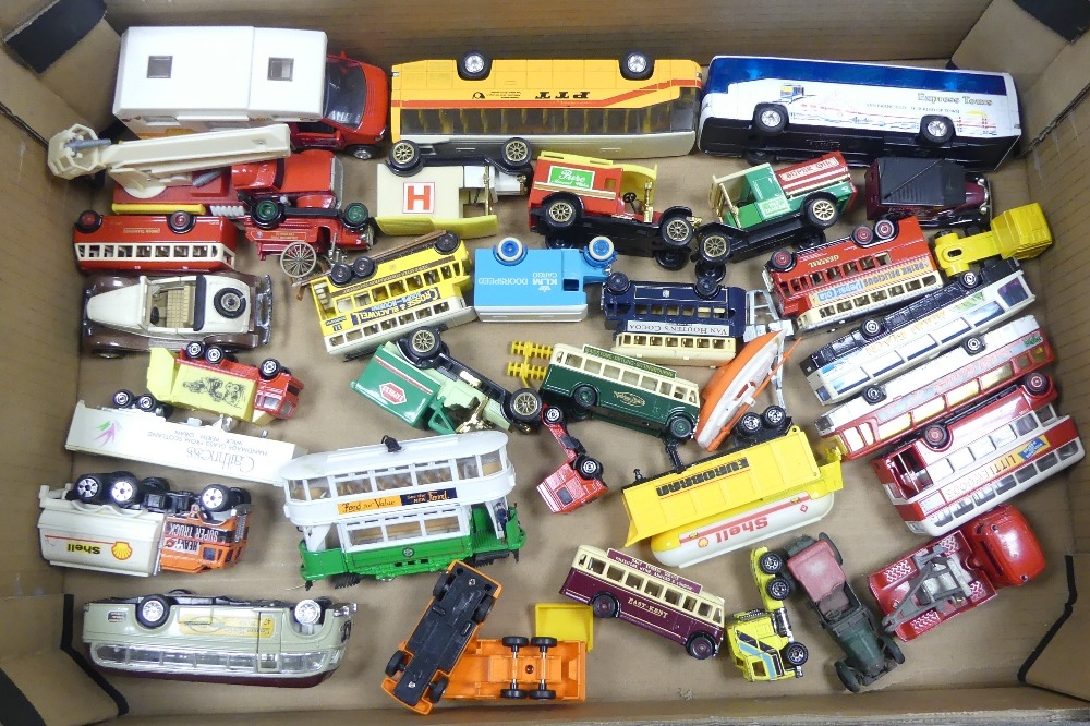 A collection of toy cars, busses and trams to include Lesney 41/2 litre Bentley, Lledo advertising
