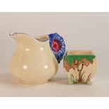 Clarice Cliff Newport Pottery Floral Moulded Milk Jug together with a small Bizarre Sugar Bowl a/