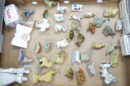 A collection of Wade figures and Whimsies to include elephants, brown bear, bison, hippopotamus, etc