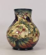 Moorcroft Tiger Lily vase . Signed by Nicola Slaney, dated 1999. Height 15.5cm, boxed