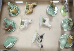 A collection of Wade spoon rests and dog figures to include Champion Ship Series, Spaniels, Old
