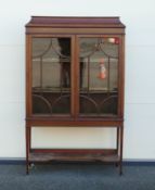 Edwardian Mahogany inlaid two door display cabinet. H.167cm W. 105cm D. 36cm.