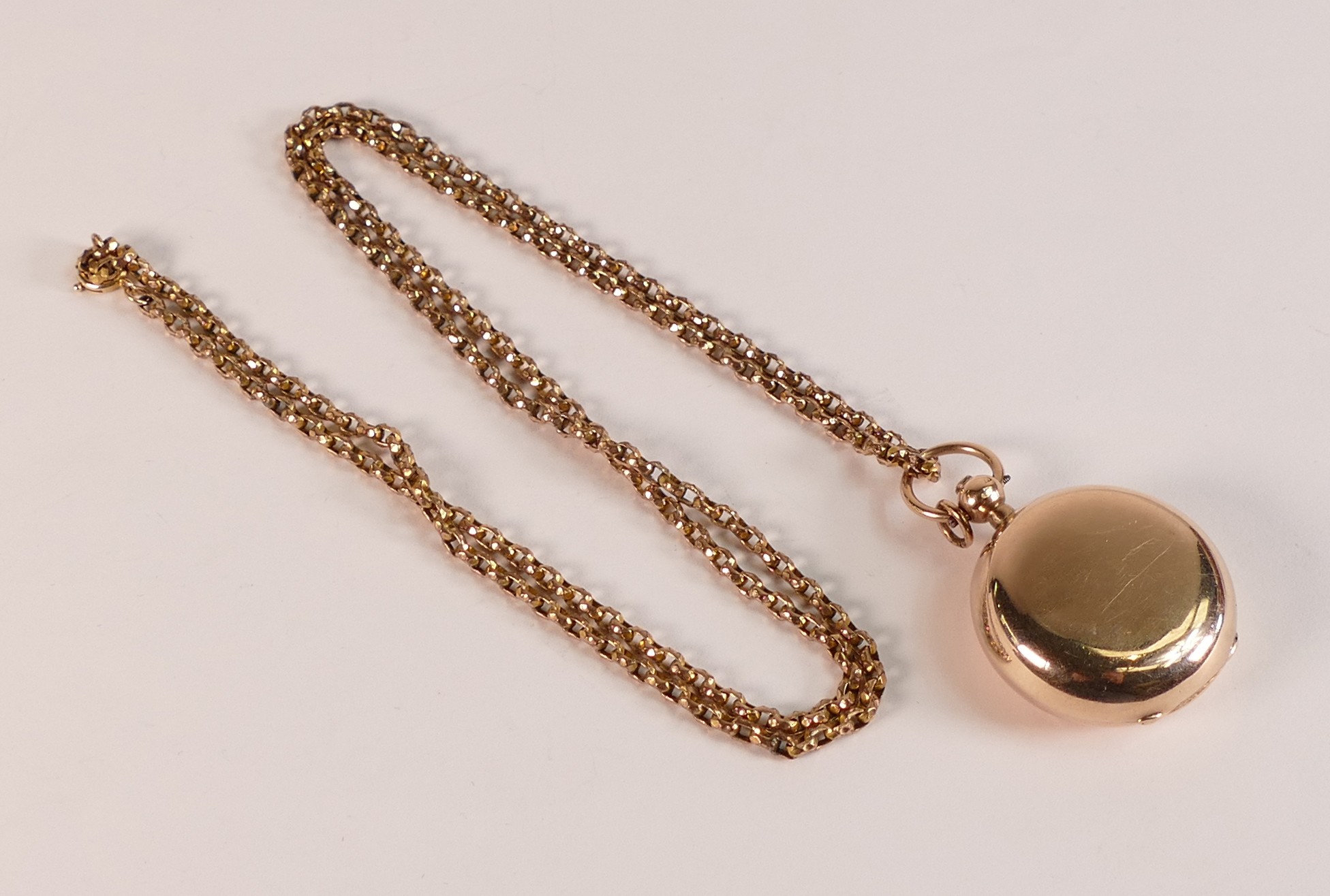 9ct Gold Sovereign holder with 9ct Gold necklace, c1900, 32.5g.