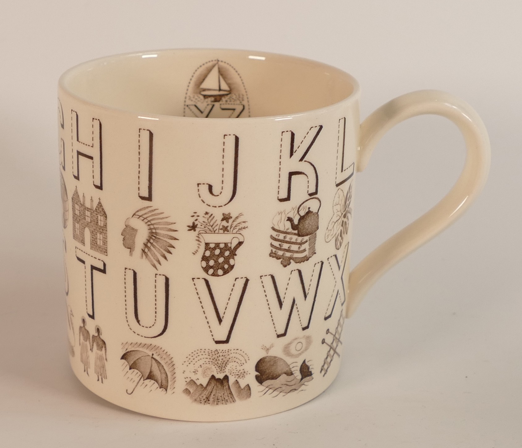 An original Wedgwood pottery Alphabet mug, designed by Eric Ravilious, printed in sepia on a white