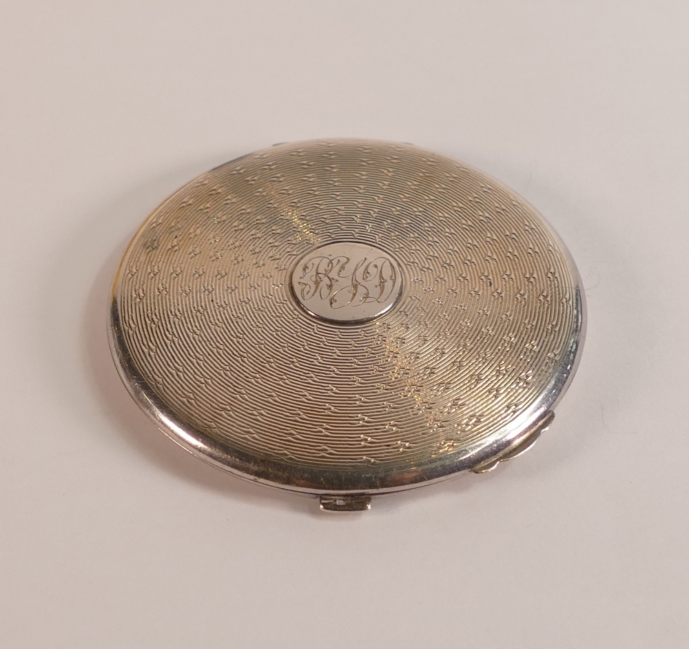 Silver compact, diameter 7cm,65.8g.