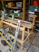 A Rexon WL-12A woodworking lathe on wooden stand