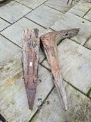 Two old pieces of oak, one having metal spike possibly from Brighton Pier
