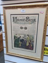 A pair of antique Harper's Bazar framed pictures
