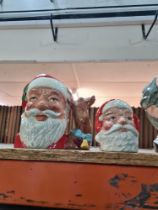 Three large Doulton character jugs of Santa Clause, Shakespeare and Falstaff with matching smaller e