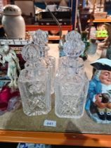 A quantity of crystal decanters, ceramics, figures and a model car