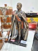 A Spelter figural lighter in form of King George VI, a Victorian silver plated hip flask and an art