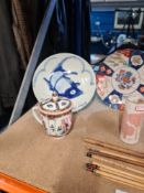 A selection of oriental ceramics including a brush pot and signed paint brushes
