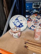 A selection of oriental ceramics including a brush pot and signed paint brushes