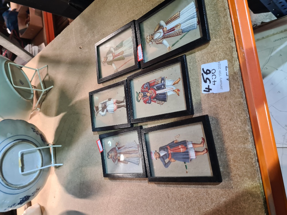 A selection of framed miniatures depicting portraits of Asian costumes