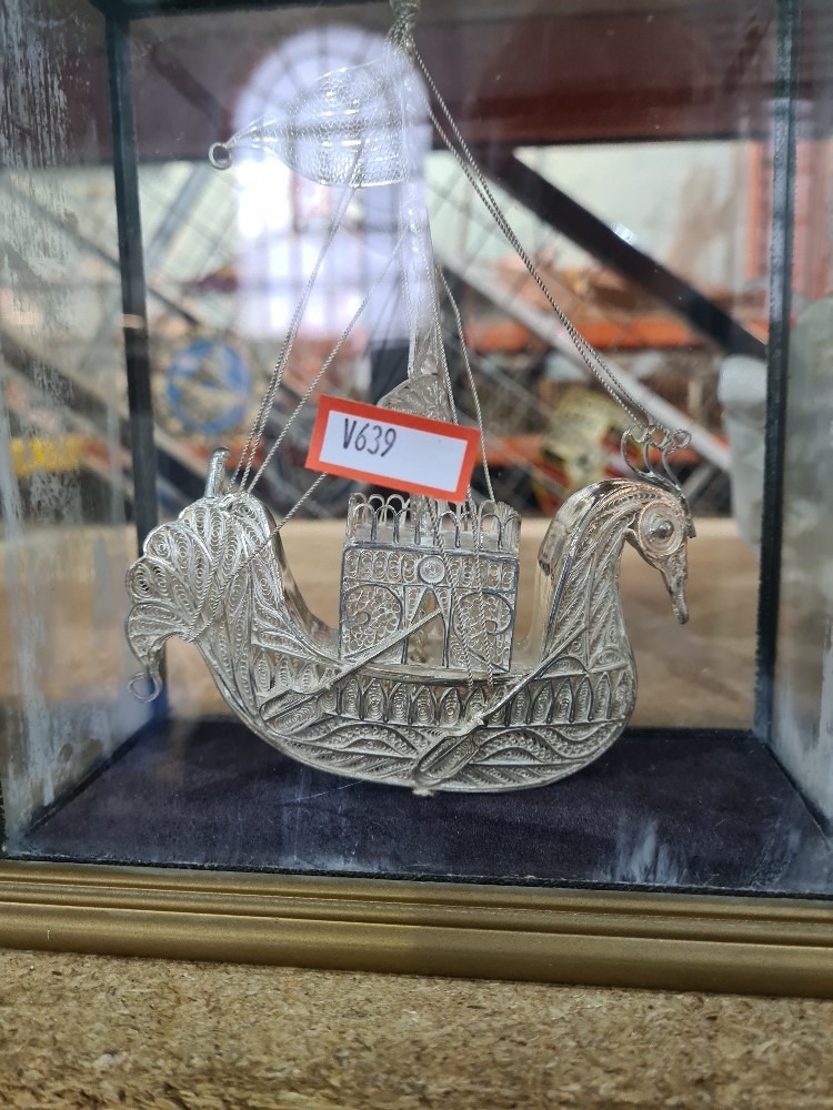 A white metal filigree ship in the form of a bird in glass case - Image 2 of 3