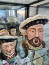 A set of 7 character jugs of Henry VIII and his 6 wives and one other larger Beswick character jug (