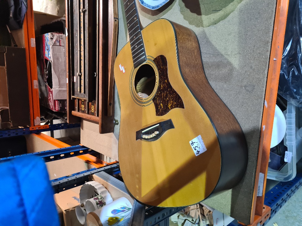 A guitar made by the 'Tanglewood Guitar Company'