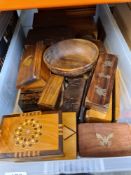 A tray containing decorative wooden boxes and similar