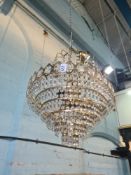 A 1970s chandelier, having tiered pendant drops