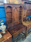 A small reproduction dresser with rack back having 2 drawers with open base, 81cm