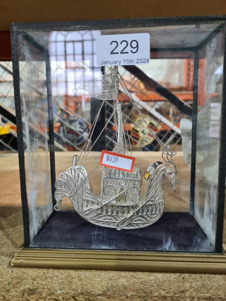 A white metal filigree ship in the form of a bird in glass case - Image 3 of 3