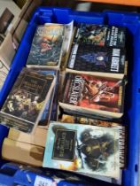 A quantity of Warhammer paperback books and others