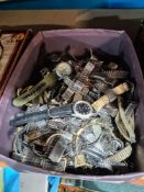 A box of wrist watches and sundry straps