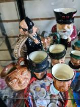 A quantity of Royal Doulton character jugs of various sizes and sundry