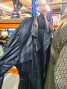 A full length black leather coat