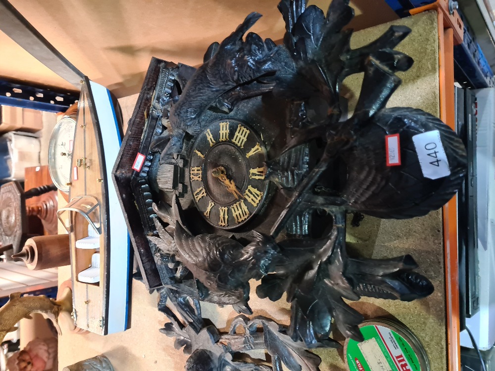 A carved wooden cuckoo clock, AF