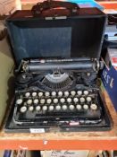 A vintage Underwood typewriter in Rexine case