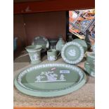 A small quantity of green Wedgwood Jasperware items including vases and dishes
