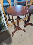 A late Victorian mahogany tripod table and one other