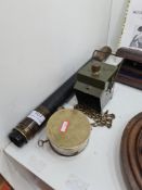 A 20th Century Night Watchman's clock, a Military bicycle lamp and a brass telescope